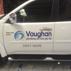 Look Design custom branded vehicle signage on a white vehicle door 