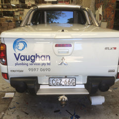 Look Design custom branded vehicle signage on the back of a pickup truck